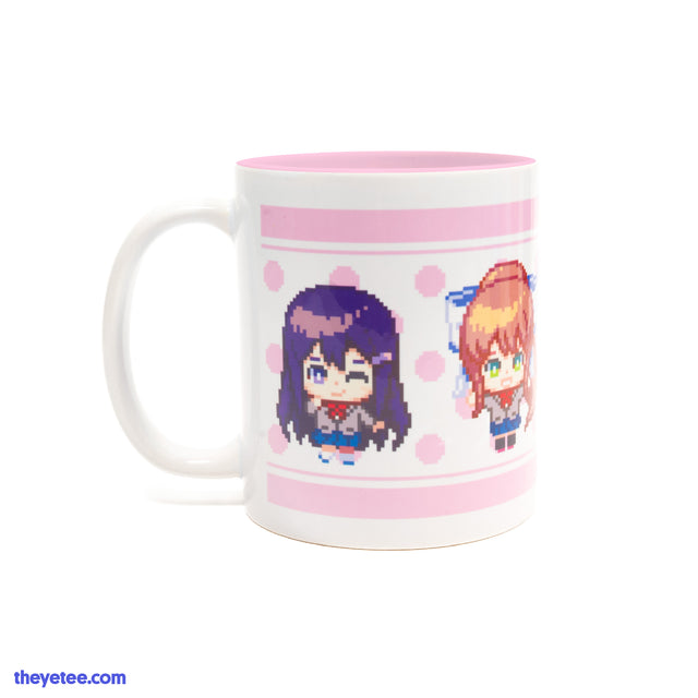 White mug with pink inside. The girls are depicted in a pixelated chibi style wrapping around the outside of the mug.  - Club Member Mug