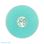 Backside of the vinyl has a vinyl sticker featuring a white cat in front of a big toothed monster.  - Pocket Rumble Soundtrack