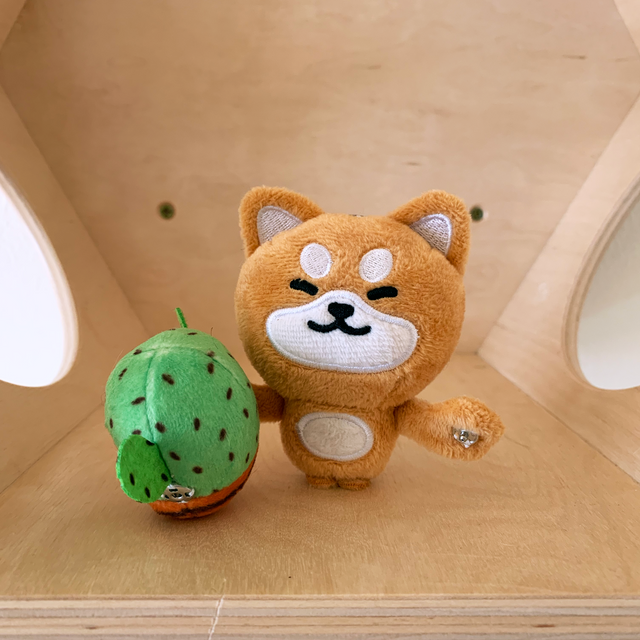 Shiba Inu plush holding cactus that snaps to hands - Shiba Inu Snappie