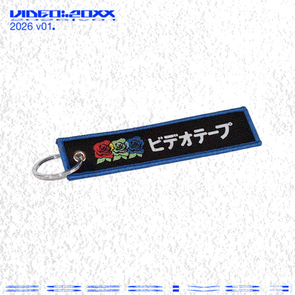 Flight Tag Bideo Tape Keychain