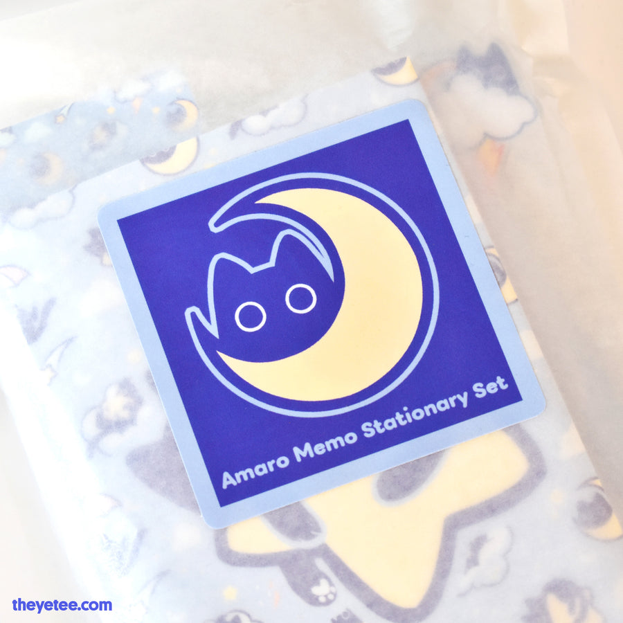 Amaro Memo Stationery Set | Amaro Memo Stationary Set packaging with a cat and moon design on a white background.