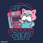 Navy tee. Mr. Button poses cheerily with an arcade machine. Below the mustachioed critter is Button City in a neon typeface.  - Button City Arcade