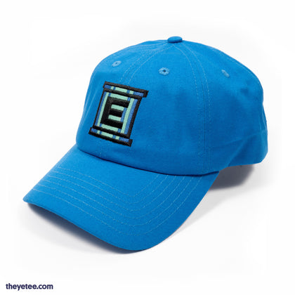 A blue dad-cap styled hat with matching blue Energy Tank logo embroidered on the front. Mega Man logo embroidered on the back