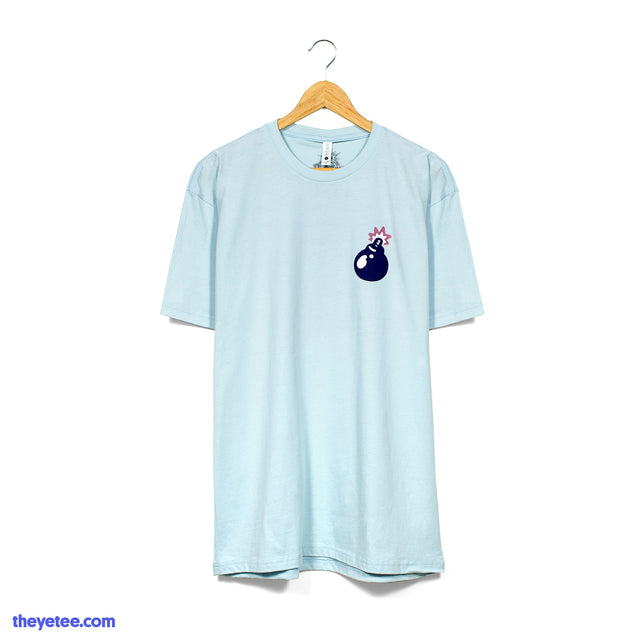 Light blue tee with two print locations. Front has a blue bomb with a lit fuse.  - Oops