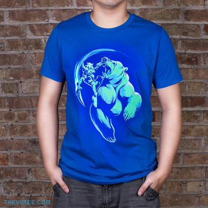 Blue tee shirt. Bodvar scales the giant bear Grothnar to deliver the final blow with a sword