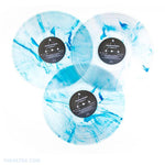 Three clear vinyls with Blue Streaks laid on top of one another. - Lagrange Point