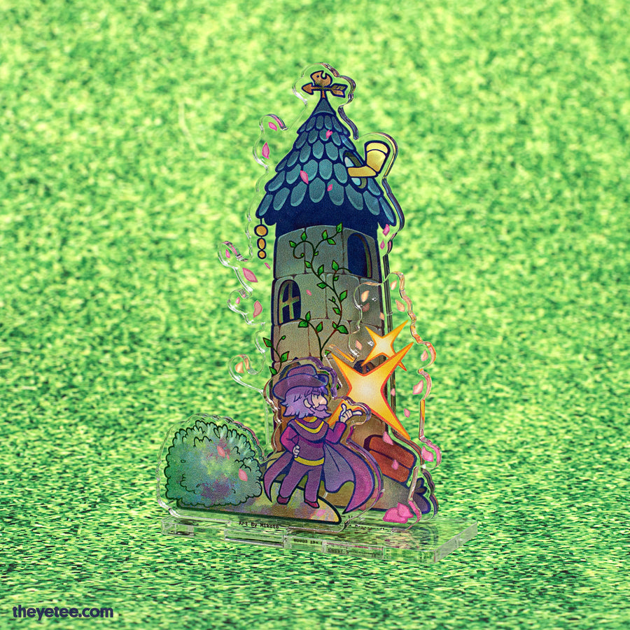 The Magic of Spring | M. Rasmodius in purple hat and cloak snaps their fingers in front of their wizard tower unleashing pink petals and sparkles. 