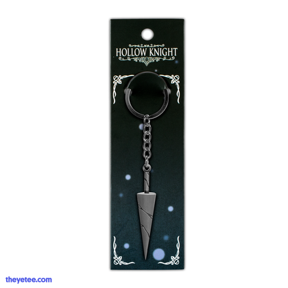 Matte silver old nail keychain in black to blue ombre packaging.
