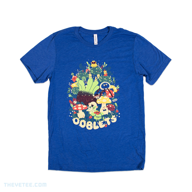 Blue tee shirt. Badgetown, Mamoonia, and Nullwhere ooblets  gathered in foliage. Also present are Dooziedug and Pantabear.  - Ooblet Friends