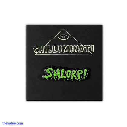Hard enamel pin in drip font says shlorp! in green