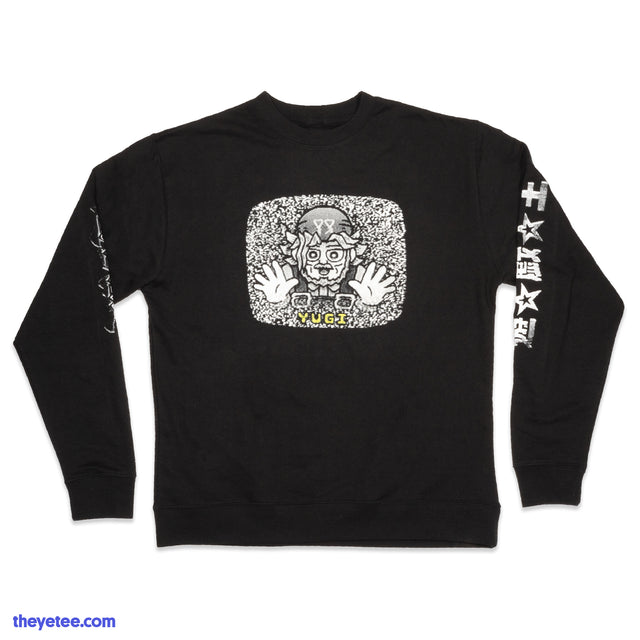 Trapped inside a TV screen with video static is Yugi's Grandpa with the caption "Yugi" in yellow. Both sleeve have Yu-Gi-Oh - Grandpa TV Crewneck
